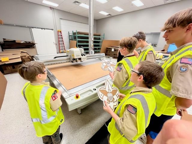 Cedar River, Iowa Boy Scouts get a tour of a corrugated box design lab